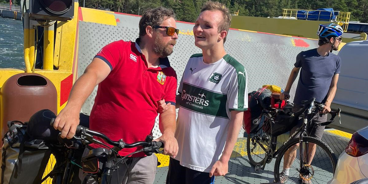 Ricky and Hamish getting ready to cycle