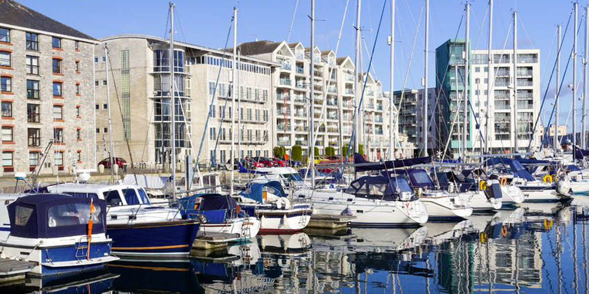 Photo of small boats moored in Plymouth docks